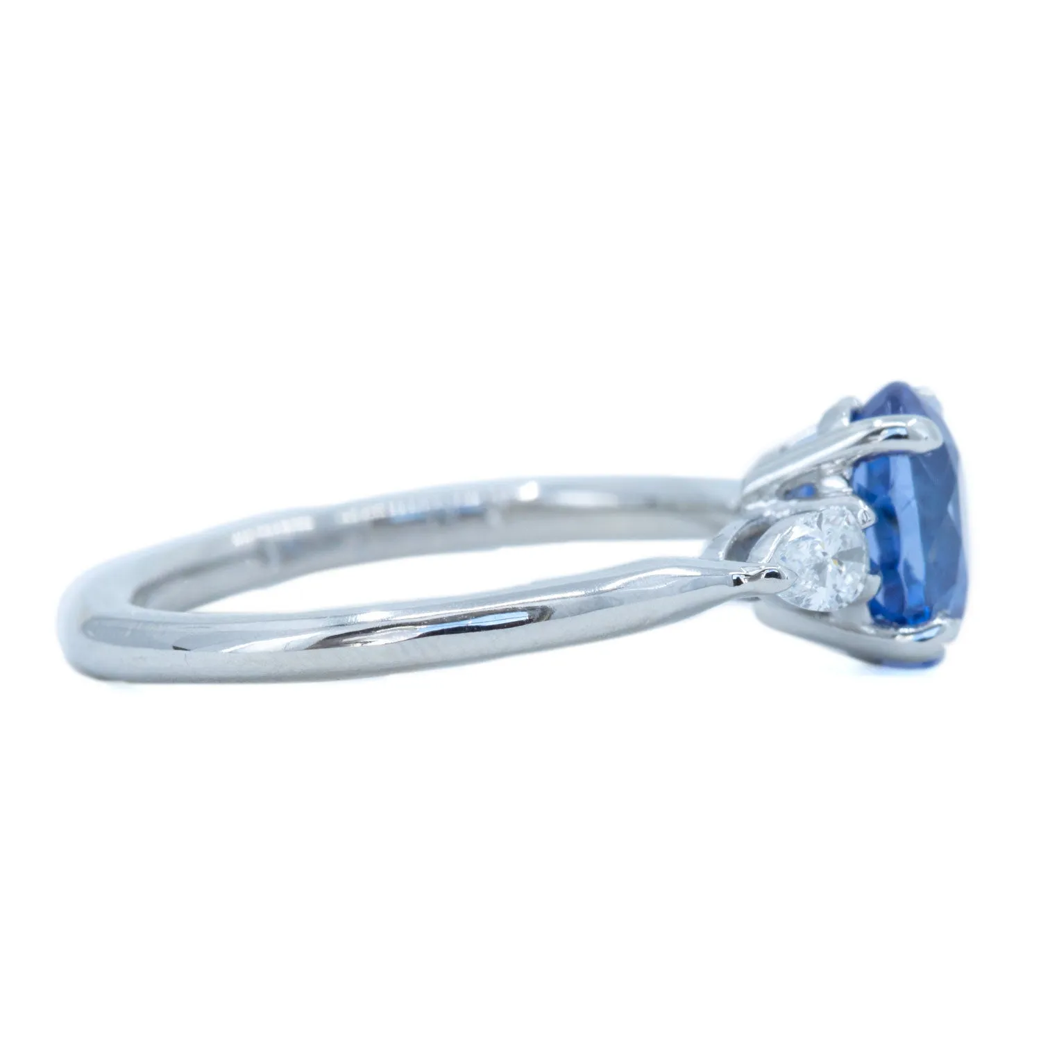 1.87ct Oval Blue Sapphire and Pear Diamond Three Stone Ring in Platinum