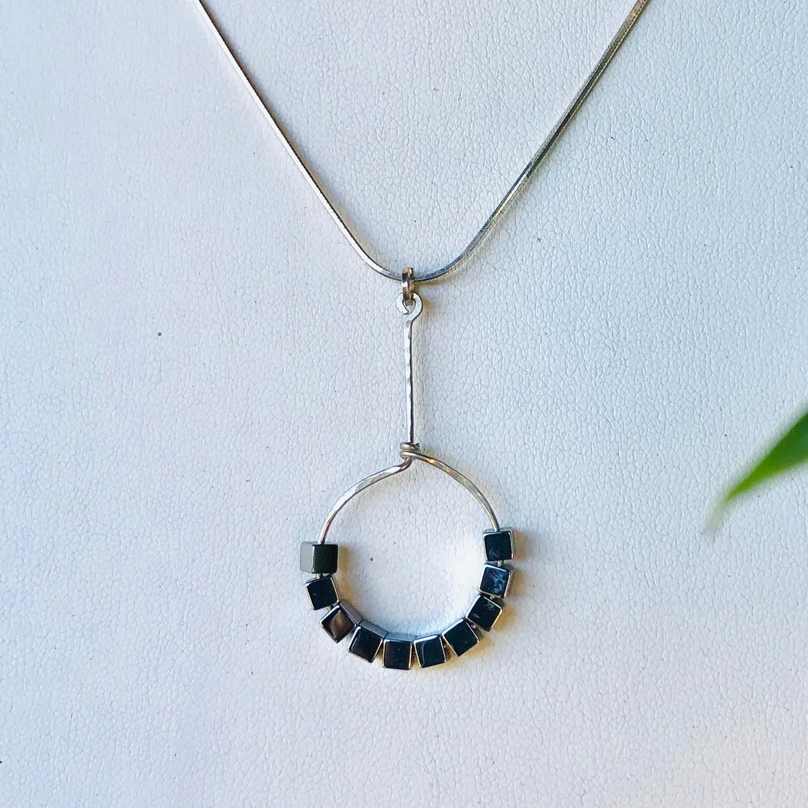 disco monocle hematite necklace