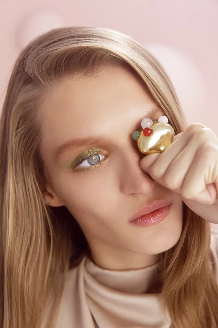 Gold statement ring with stones