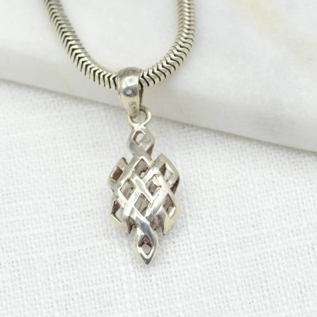 Hollow Endless Knot Silver Pendant