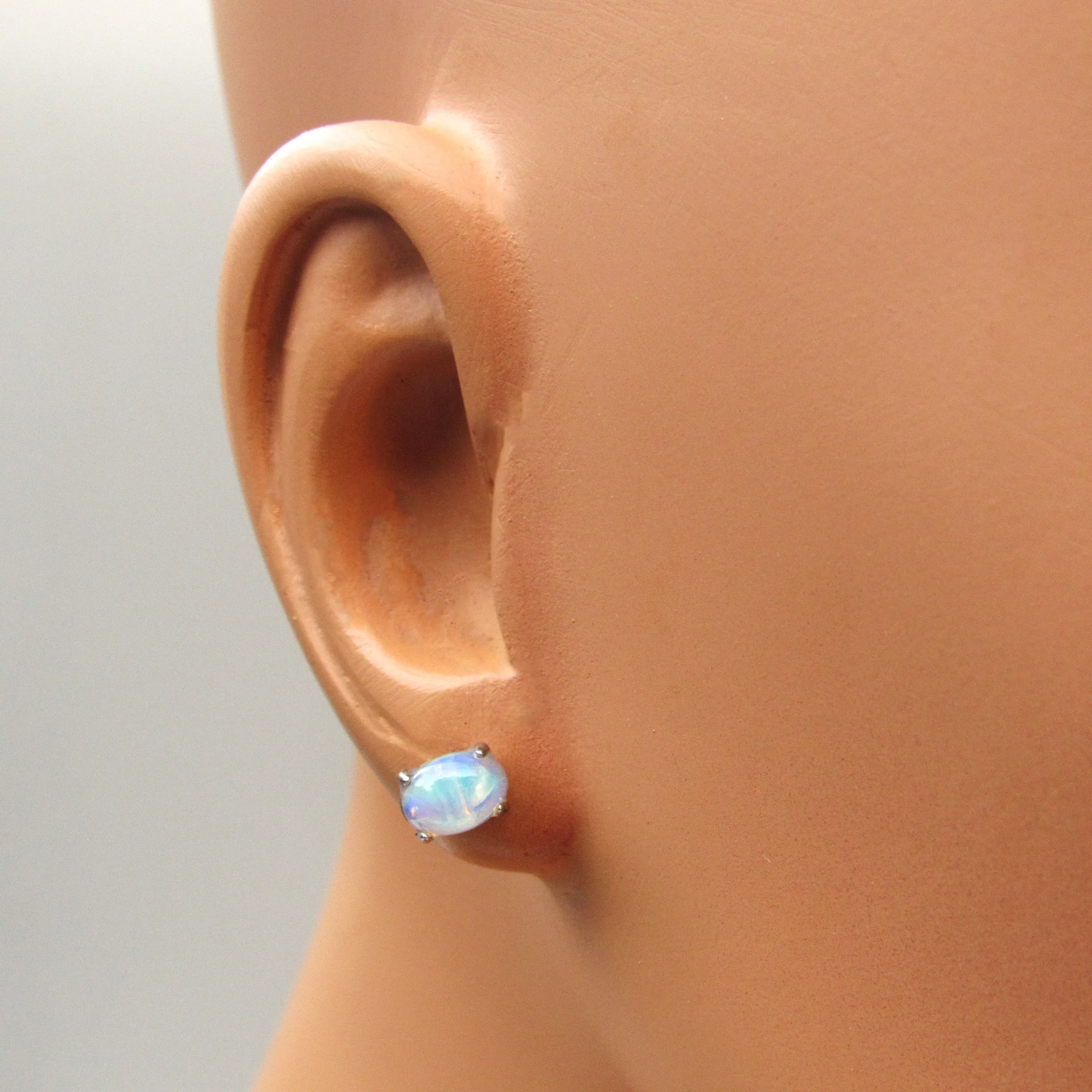 Opal gemstones and sterling silver stud earrings